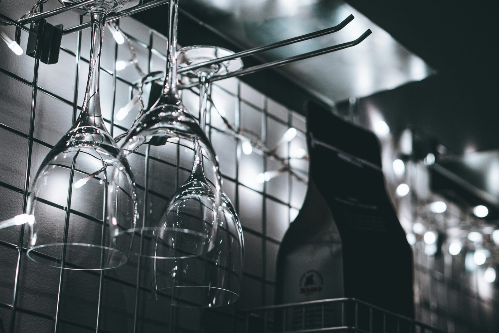 wine glasses hanging on rack